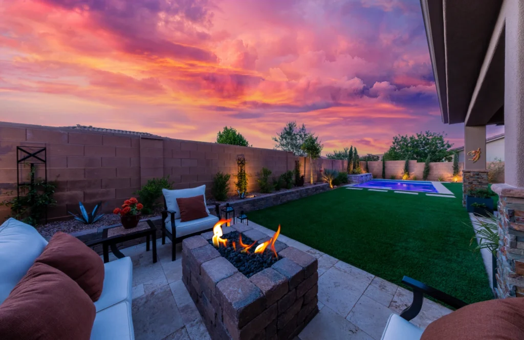 An outdoor scene featuring a beautifully installed patch of artificial grass
