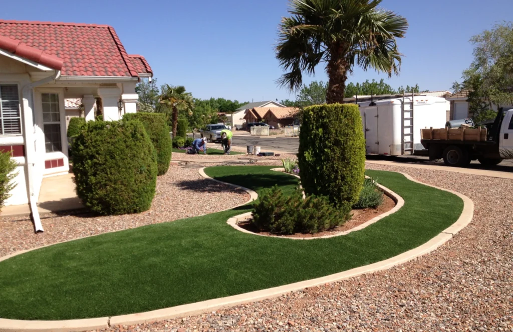 A vibrant landscape featuring a lush expanse of synthetic grass surrounded by native plants and wildlife